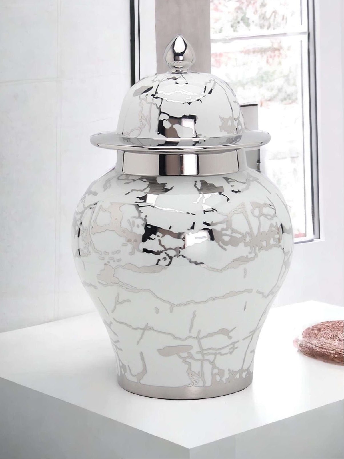 a vase sitting on top of a table