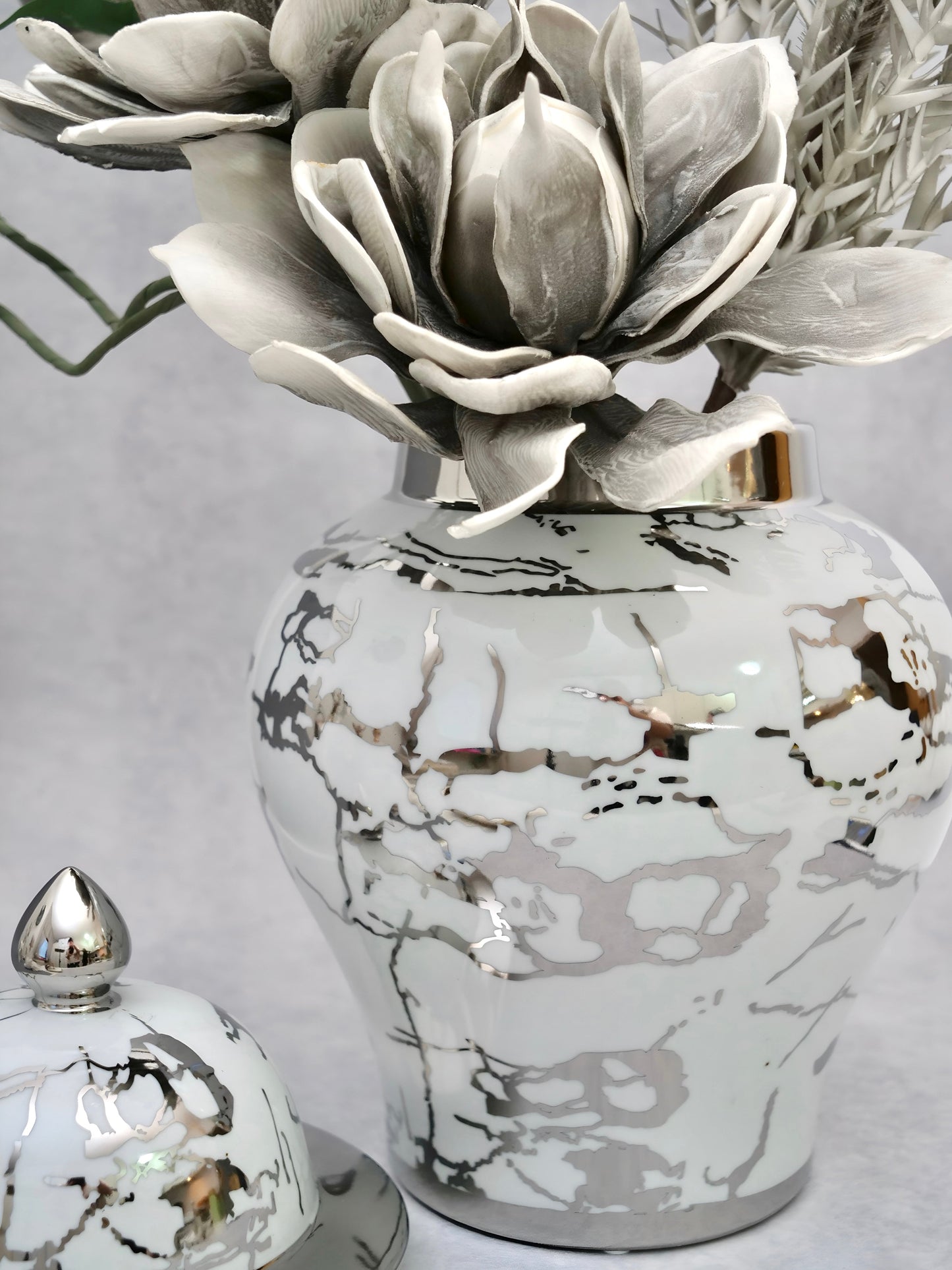 a vase that has some flowers in it