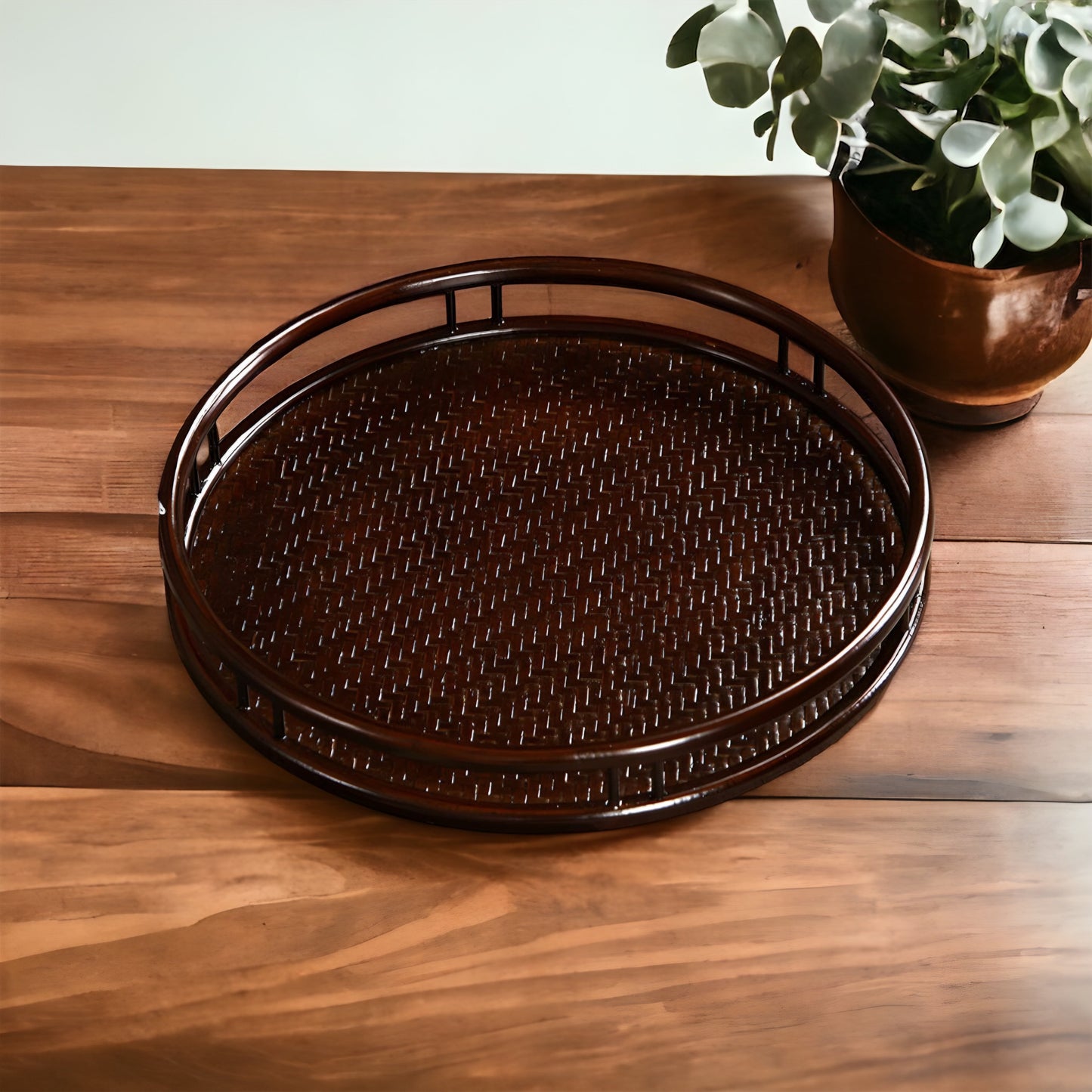 a tennis racquet sitting on top of a wooden table