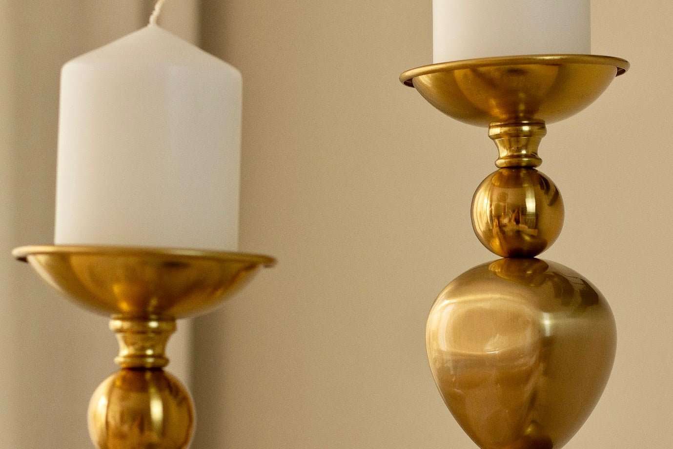 a couple of vases sitting on top of a table