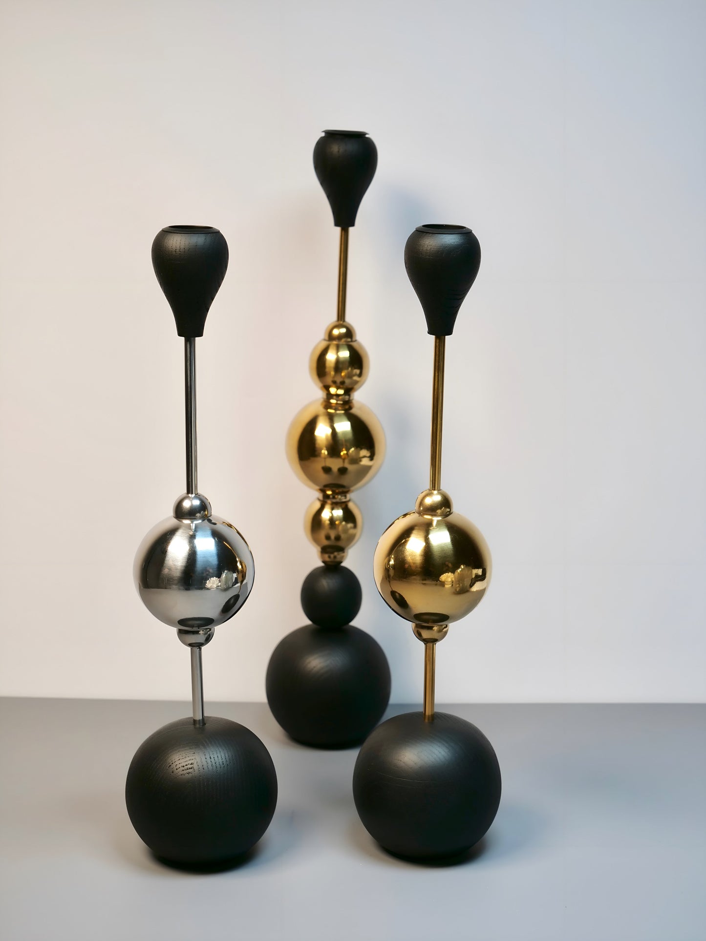 a group of vases sitting on top of a table