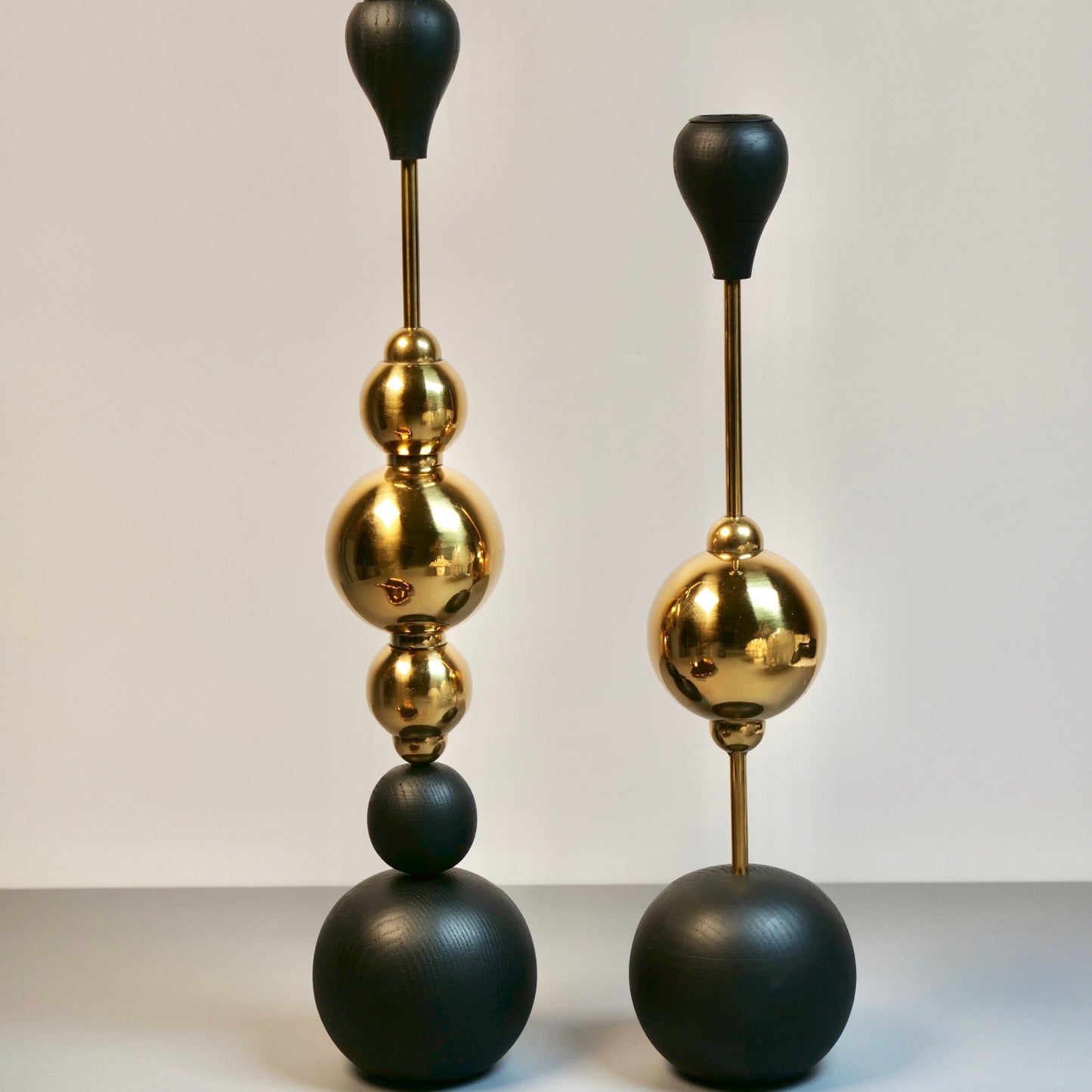 a couple of vases sitting on top of a table
