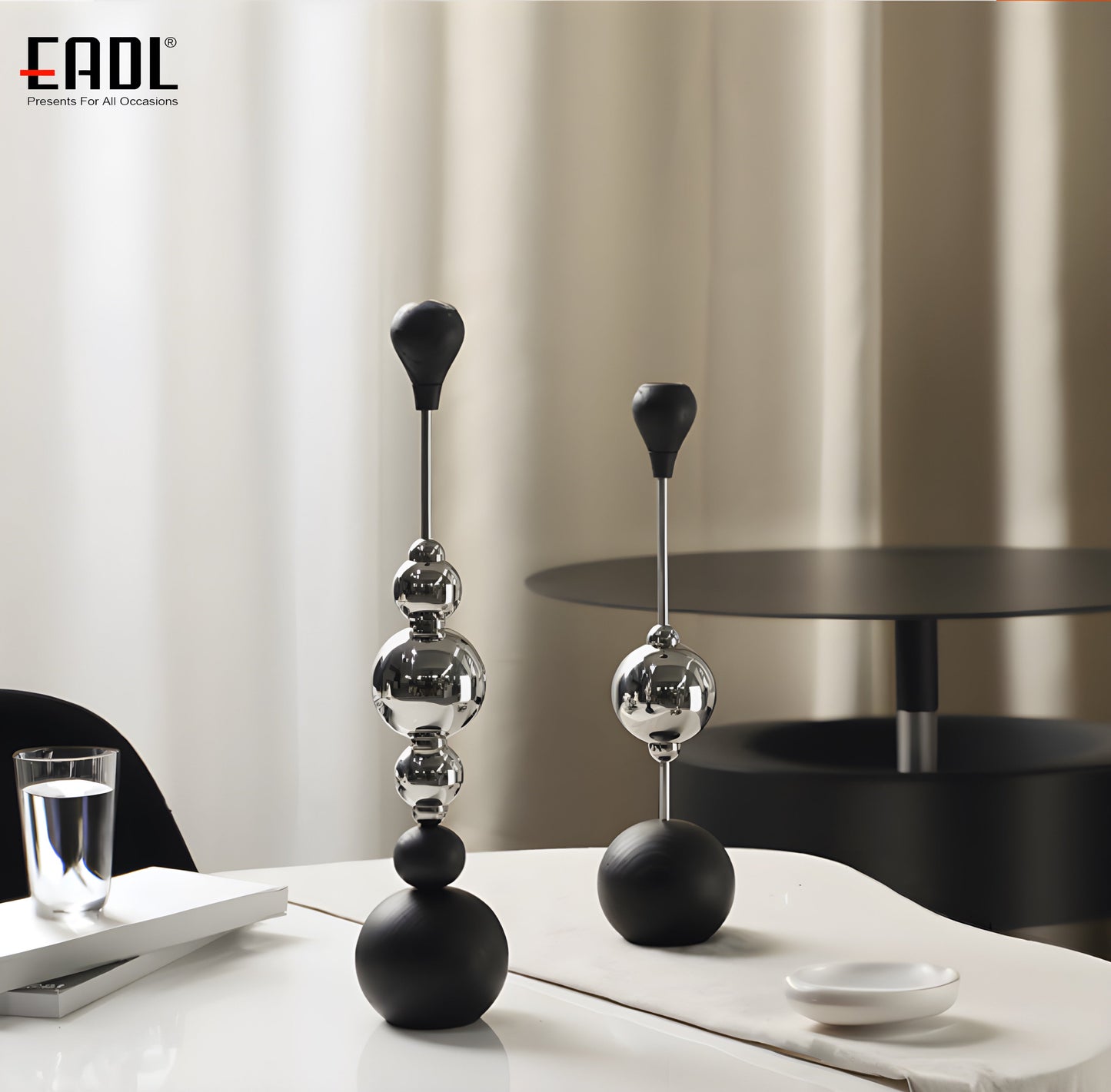 a couple of vases sitting on top of a white table
