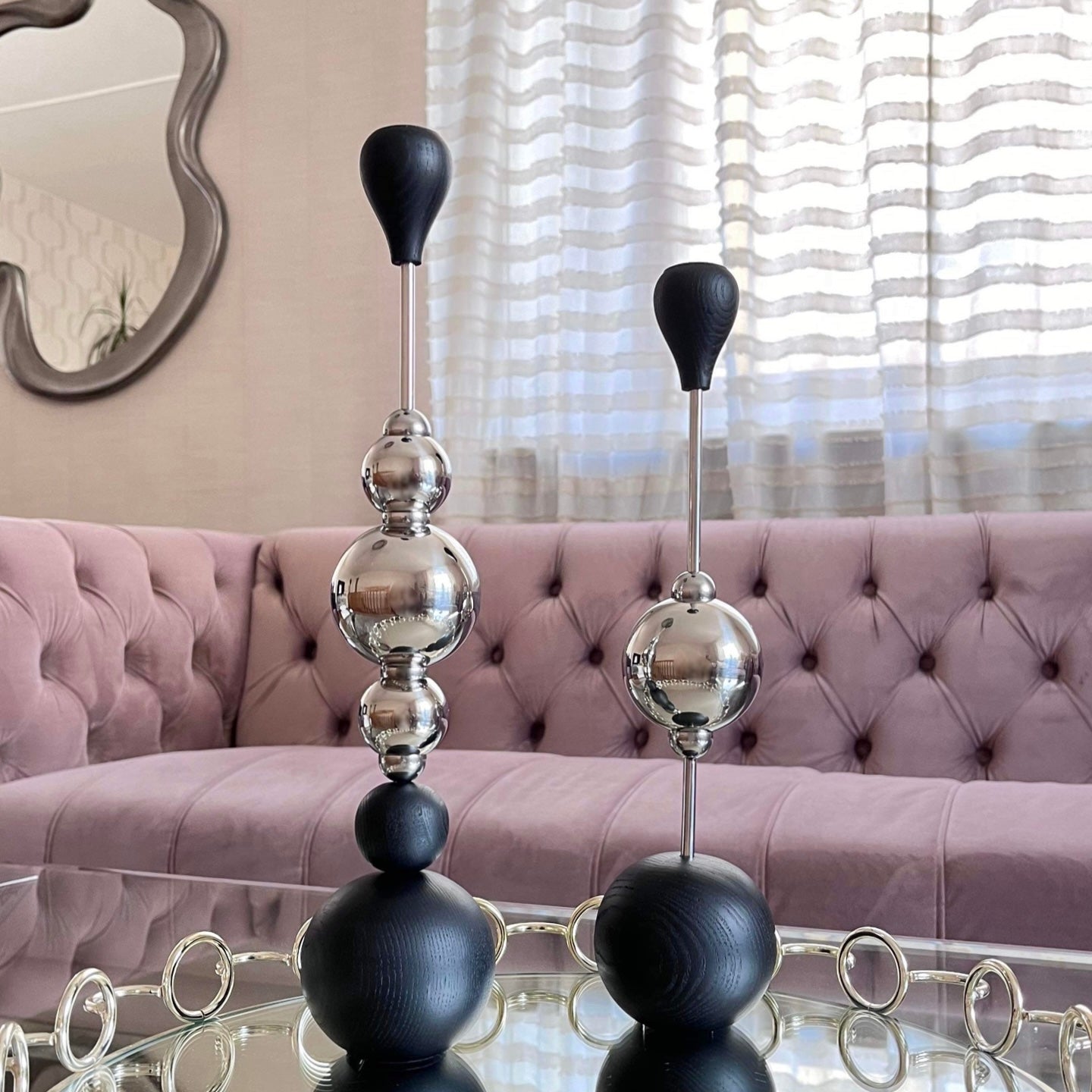 a group of vases sitting on top of a table