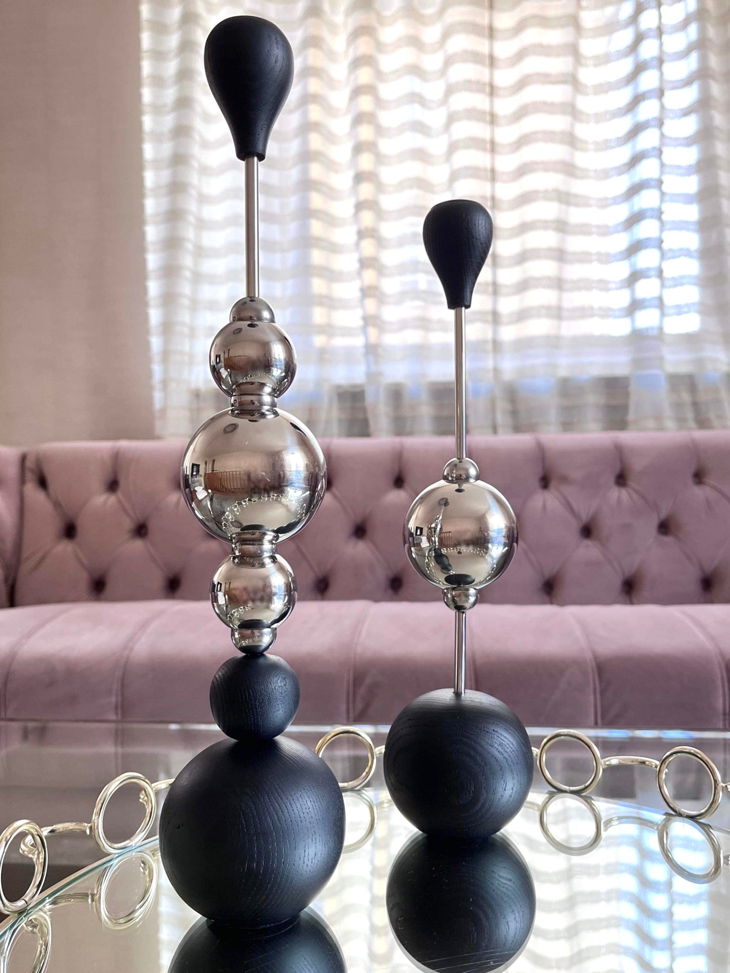 a glass of wine sitting on top of a table