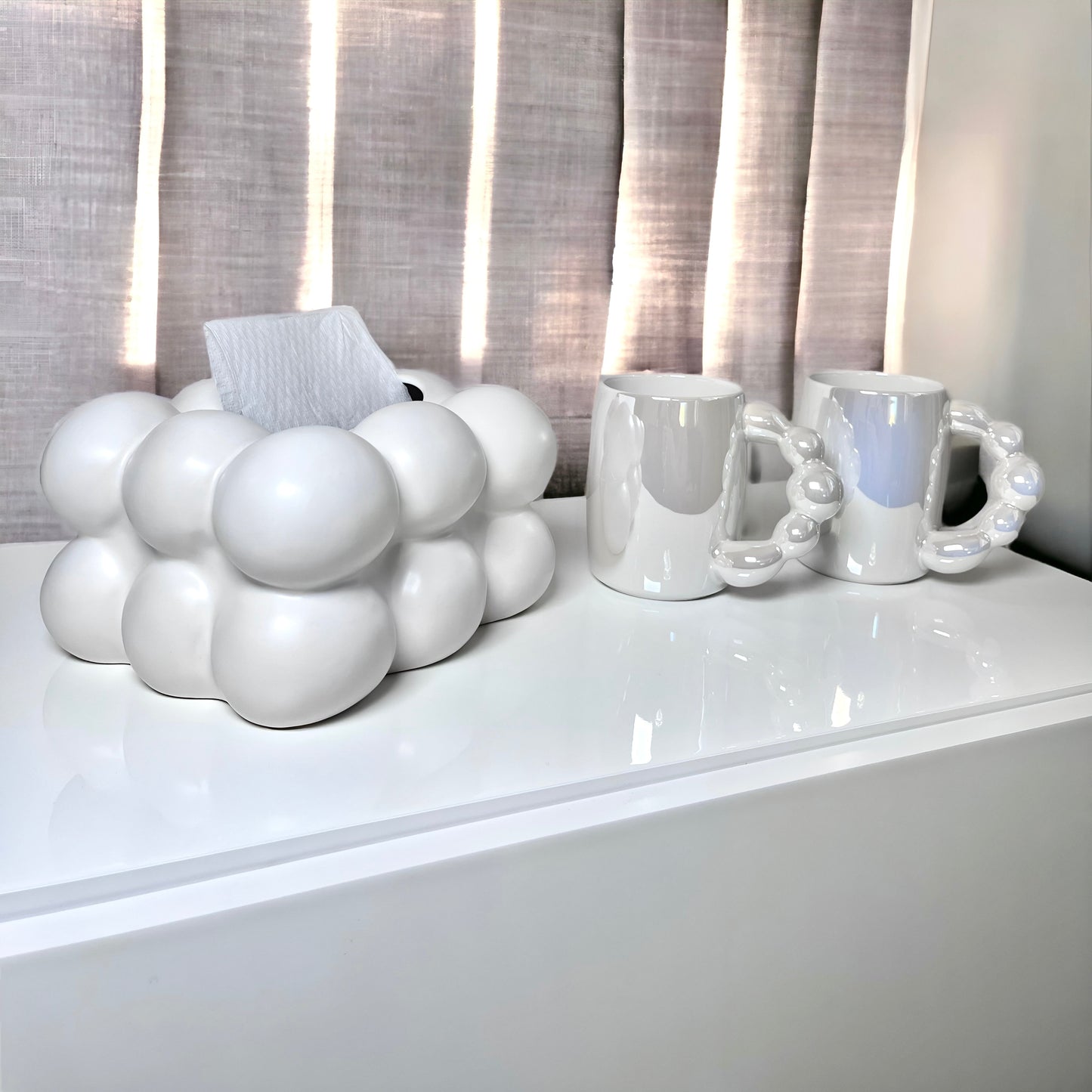 a table that has some cups on it