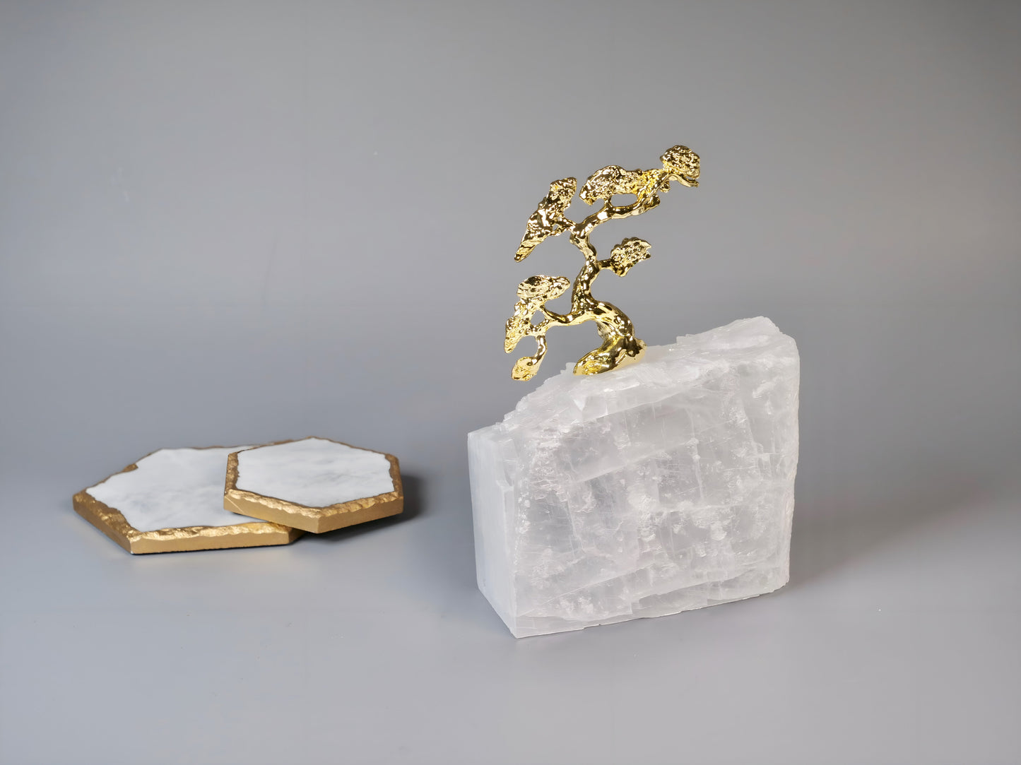 a white table topped with a white cake