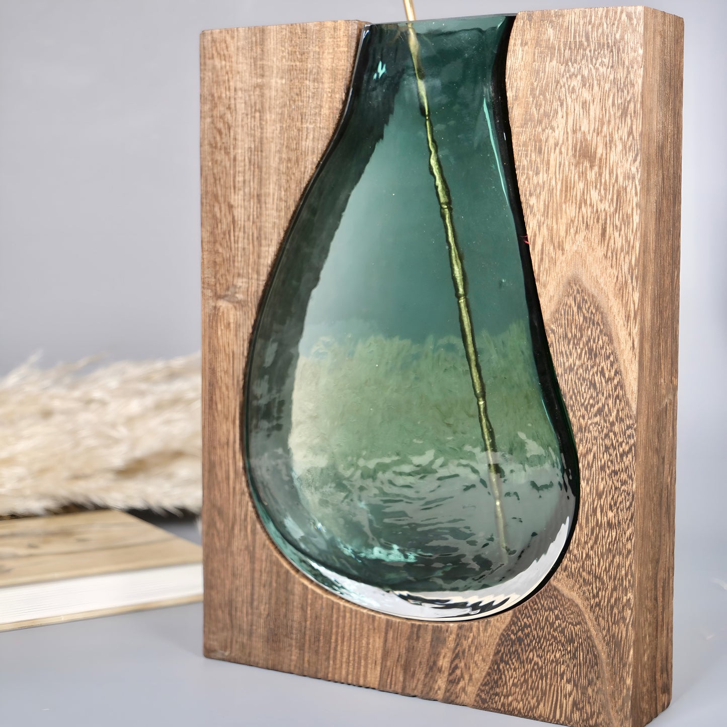 a close up of a mirror on a beach