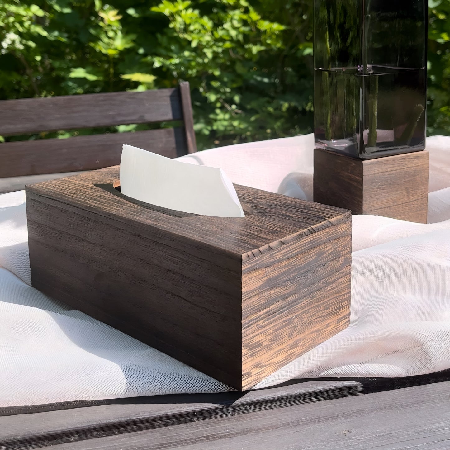 a wooden bench sitting in the middle of a park