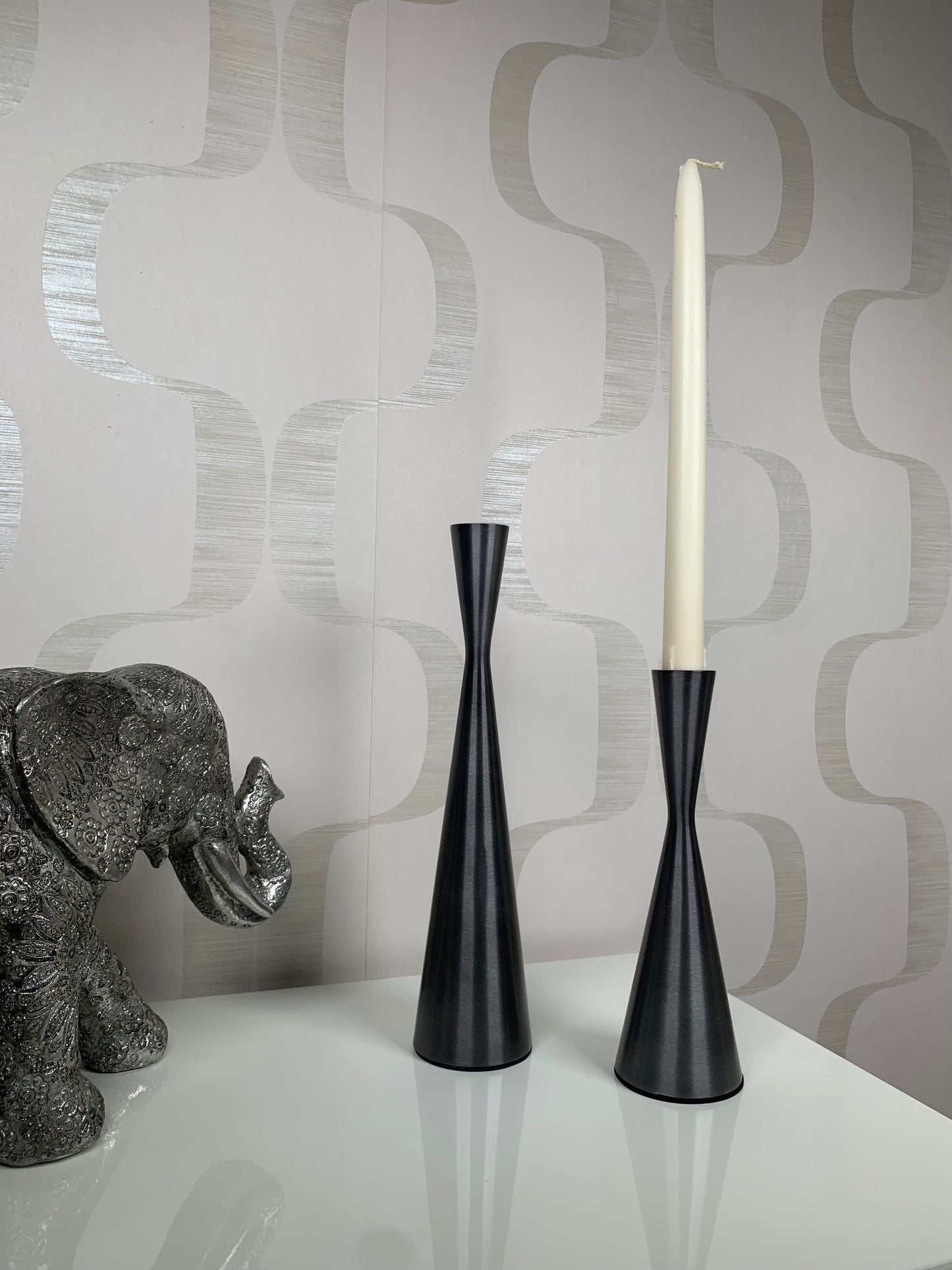 a group of vases sitting on a table