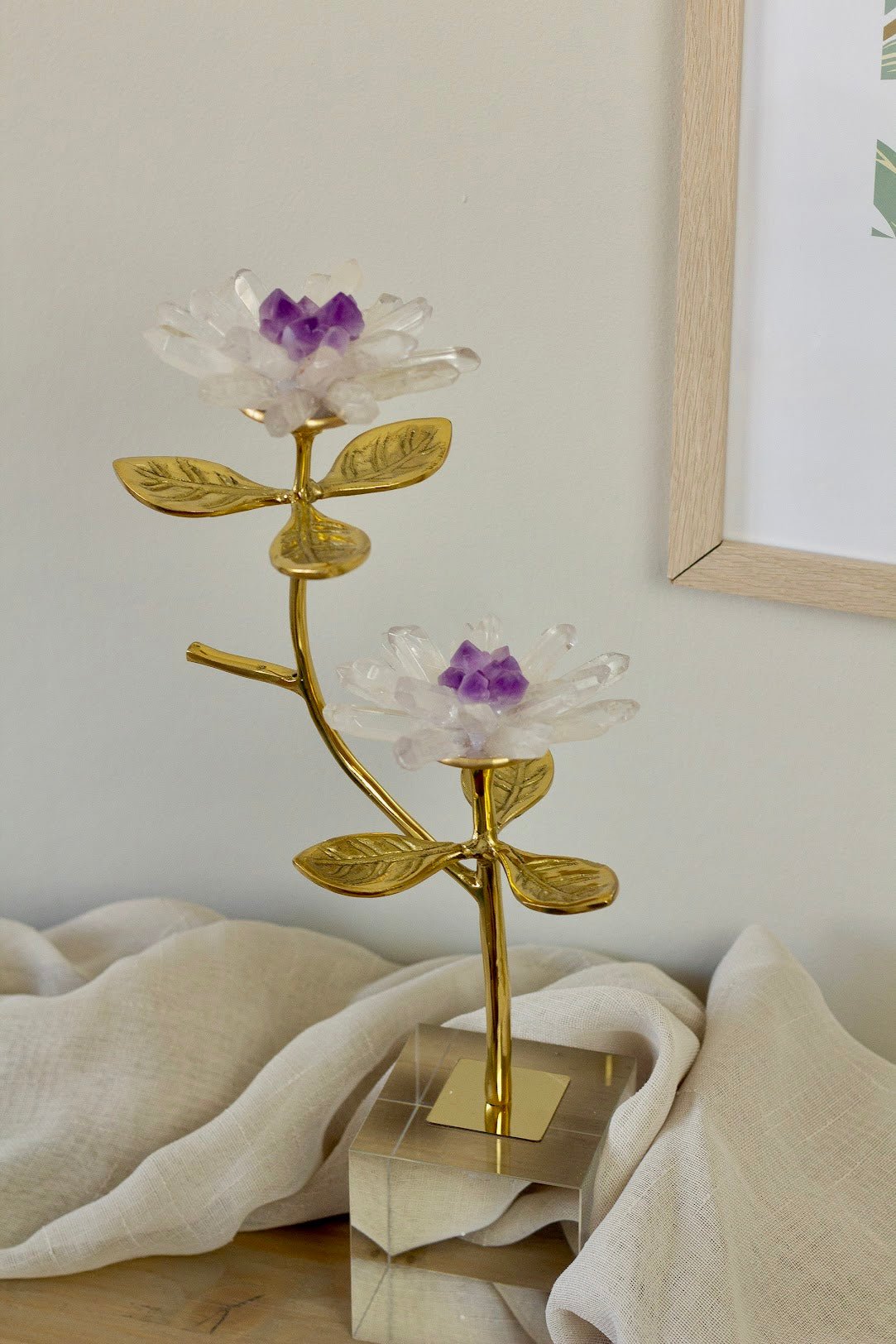 a vase of flowers sitting on a table