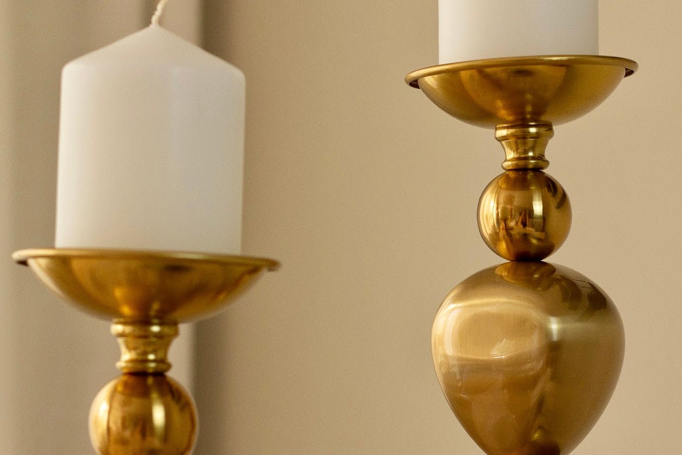 a couple of vases sitting on top of a table 