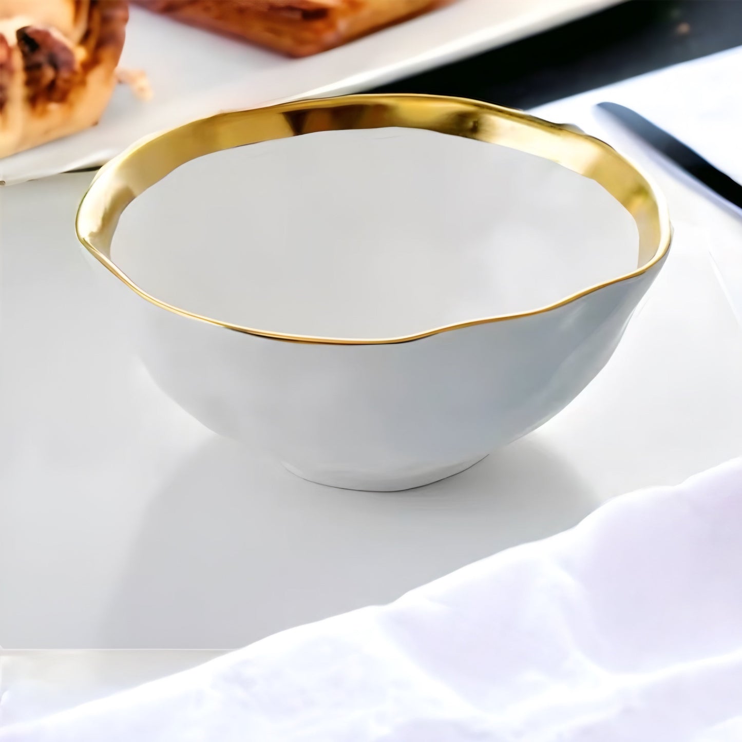 a white bowl with a spoon in it 