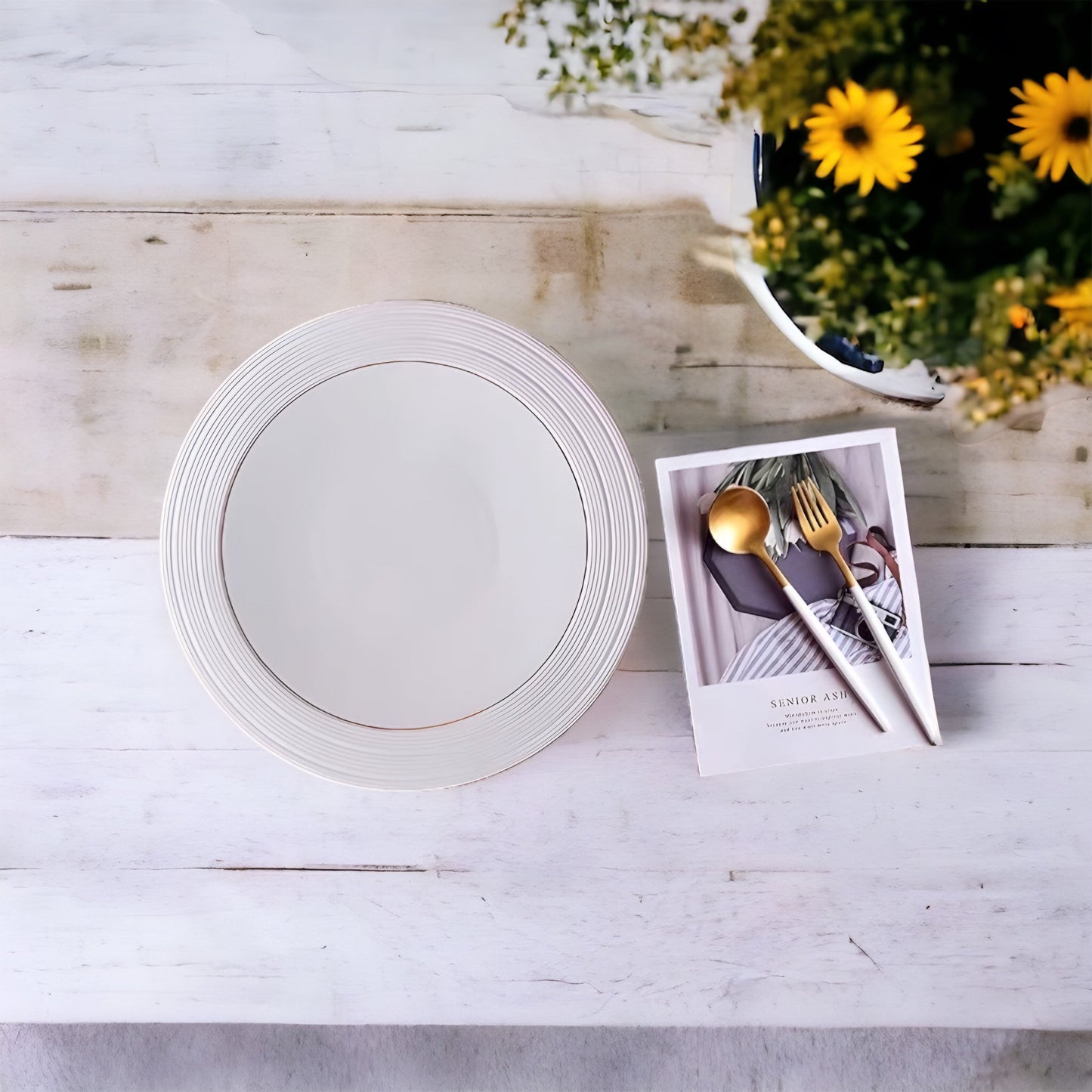 a white toilet sitting next to a bowl of flowers 