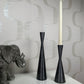 a group of vases sitting on a table 